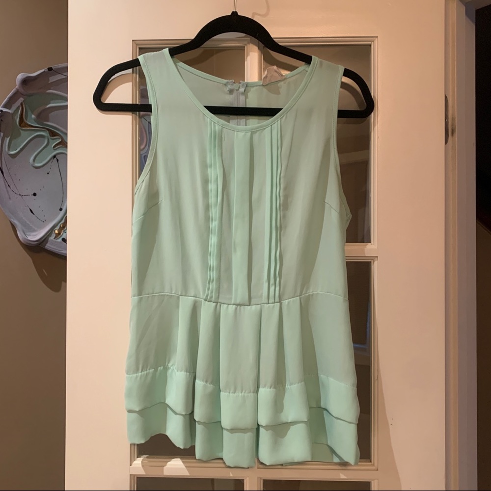 Pins & Needles mint green peplum style sleeveless blouse in size small
